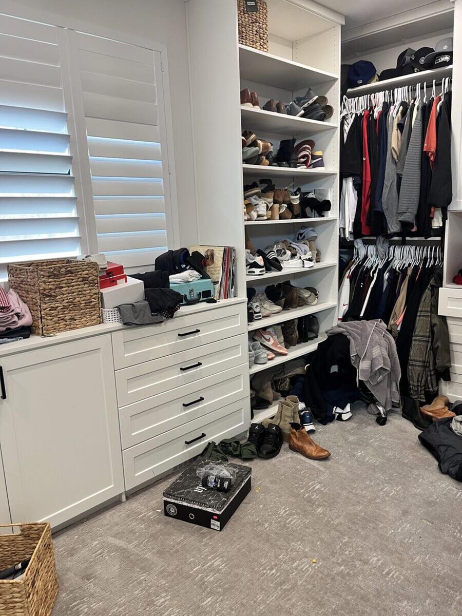 Master closet corner before organizing