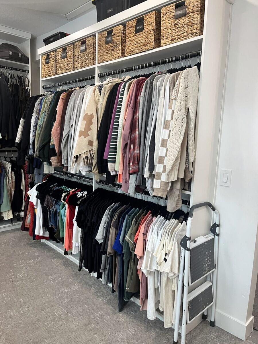 Master closet hanging area after organizing